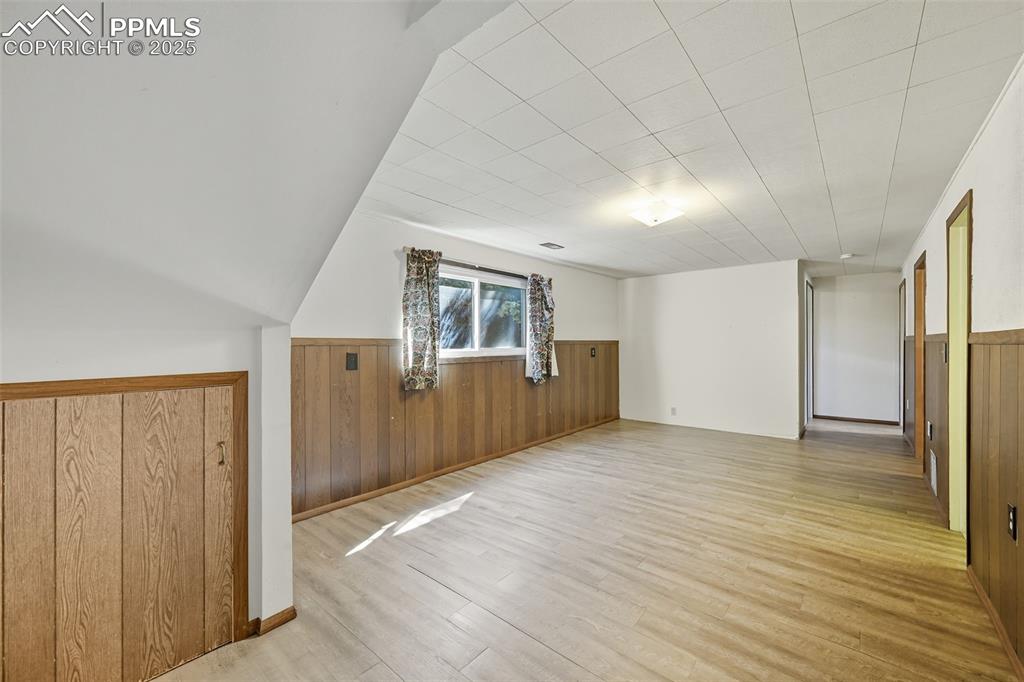 Lower family room featuring new LVP floors