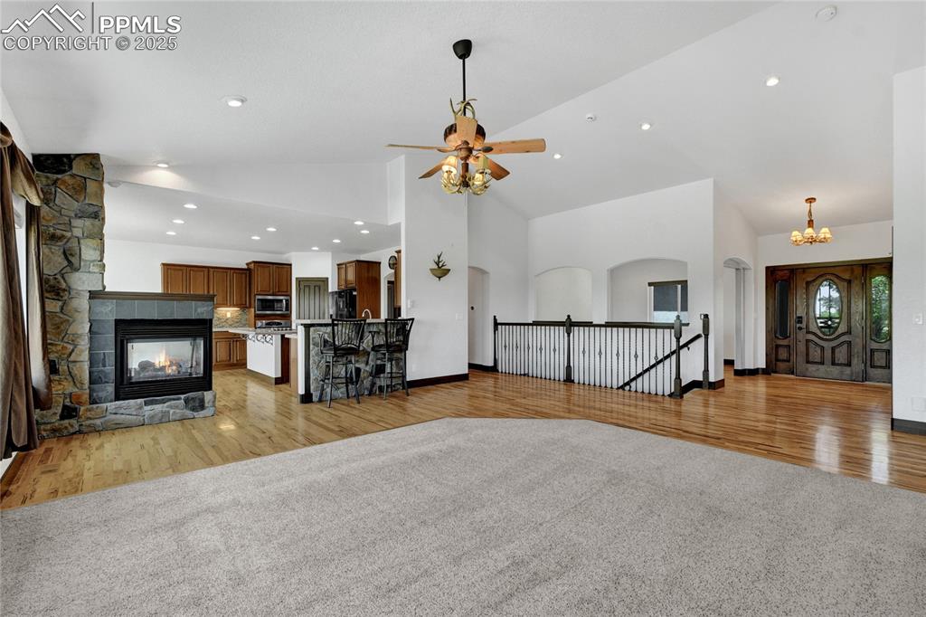 There is a dual sided fireplace to the kitchen.