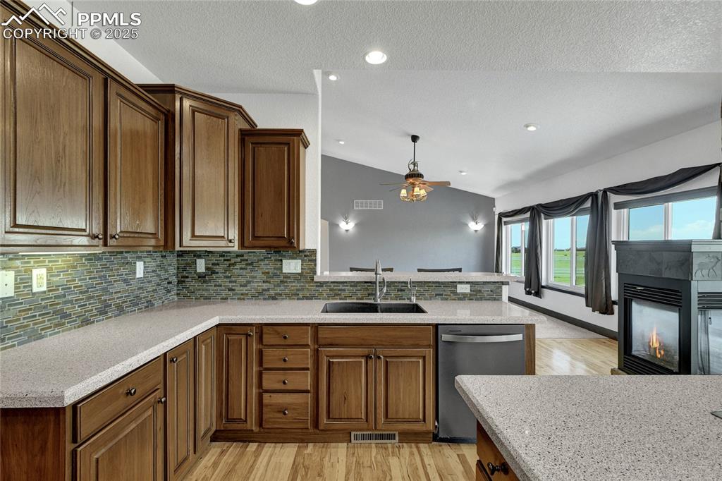 Stainless appliances, stone countertops, and so much natural light and privacy.