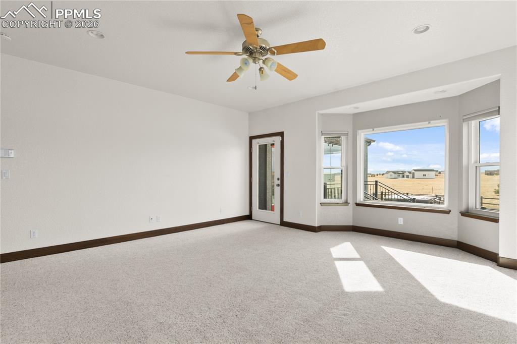 The primary opens to the deck.