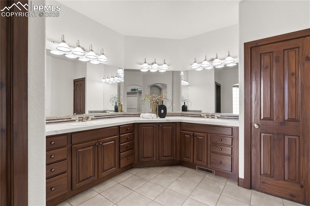 The spa like bathroom is HUGE, BEAUTIFUL, and BRIGHT