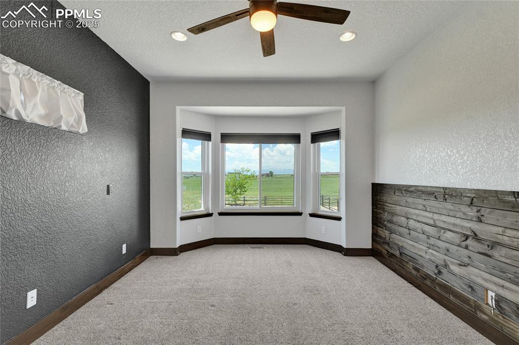 Main level bedroom with lots of space and light.
