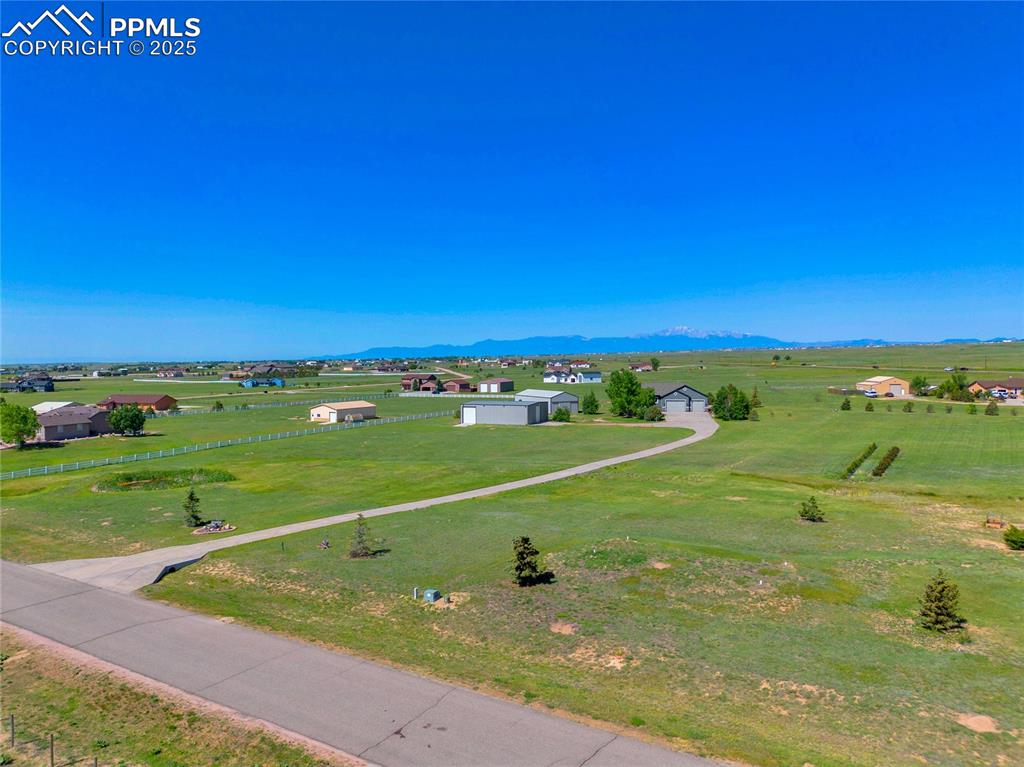 Your own piece of stunning Pikes Peak Views!  Privacy, space from your neighbors, and so much more!  Roads are paved to the home.