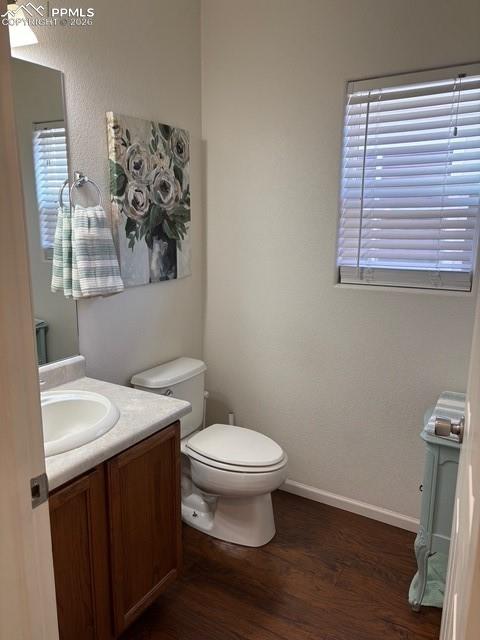 Bathroom with vanity and dark wood finished floors