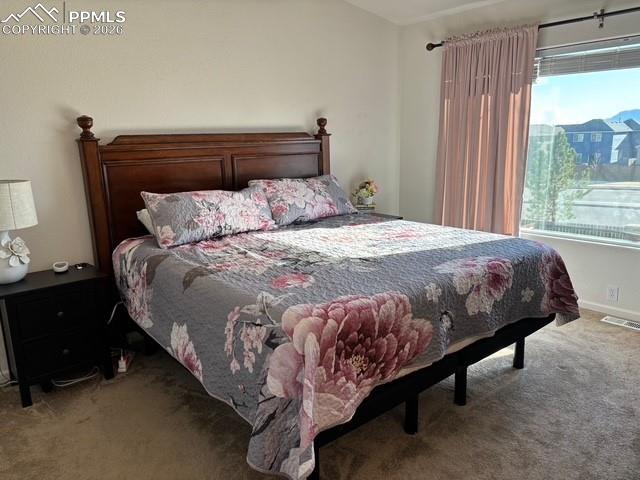 Bedroom featuring carpet flooring