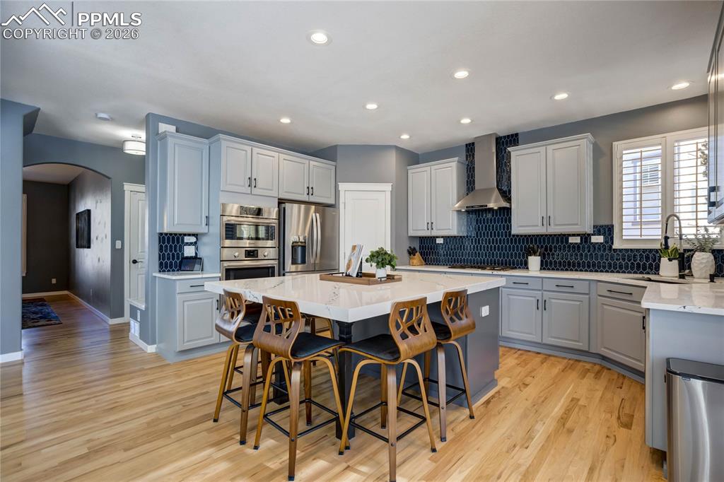 Open kitchen with island for casual dining.