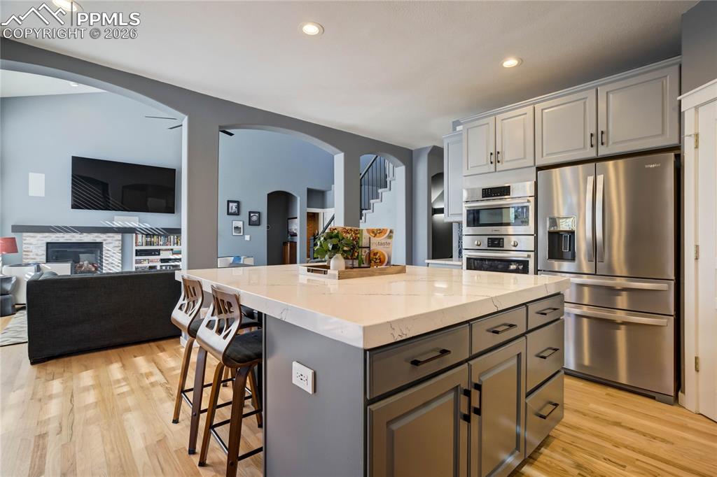Stainless steel appliances in the kitchen.
