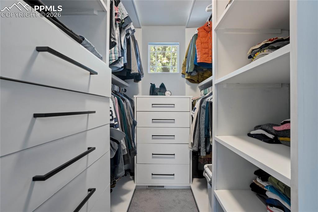 Built-ins in the primary bedroom walk-in closet.