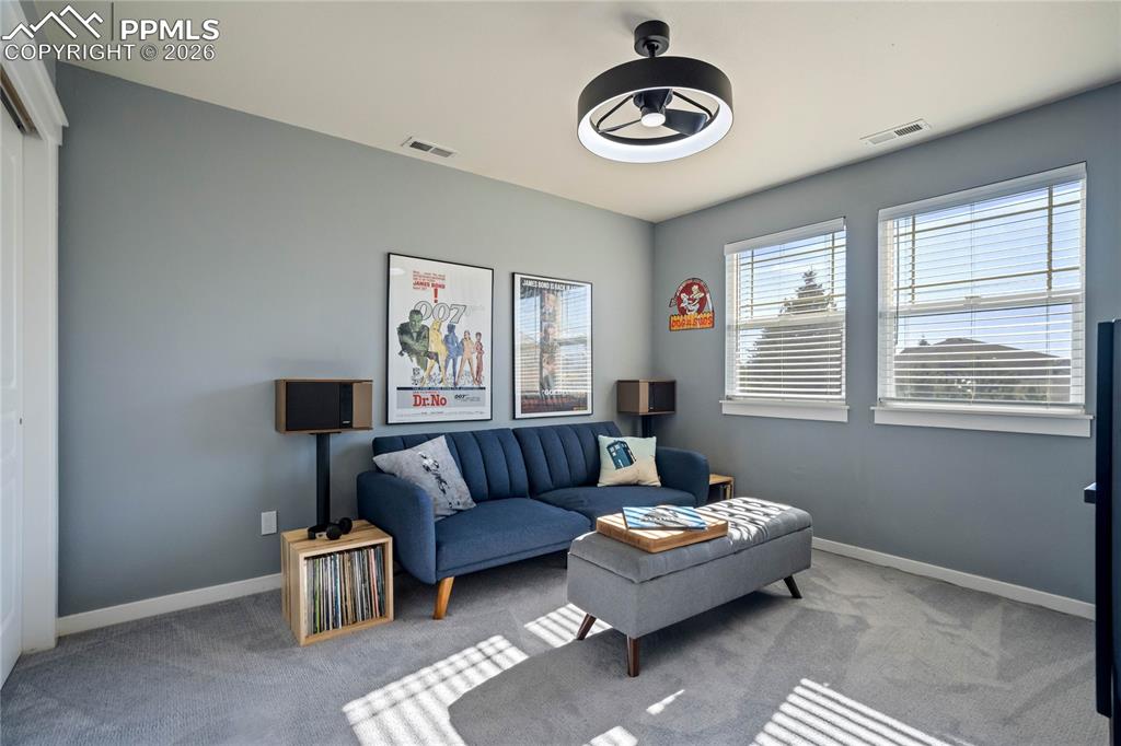 One of two secondary bedrooms on upper level.