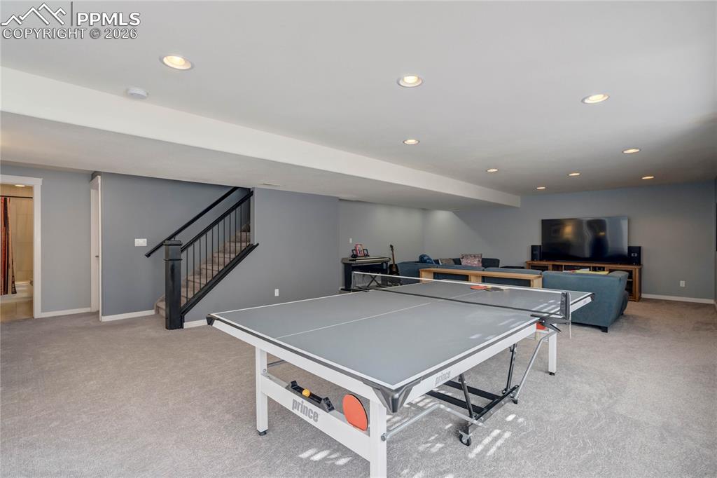 Lower level family room with plenty of space for a game table!