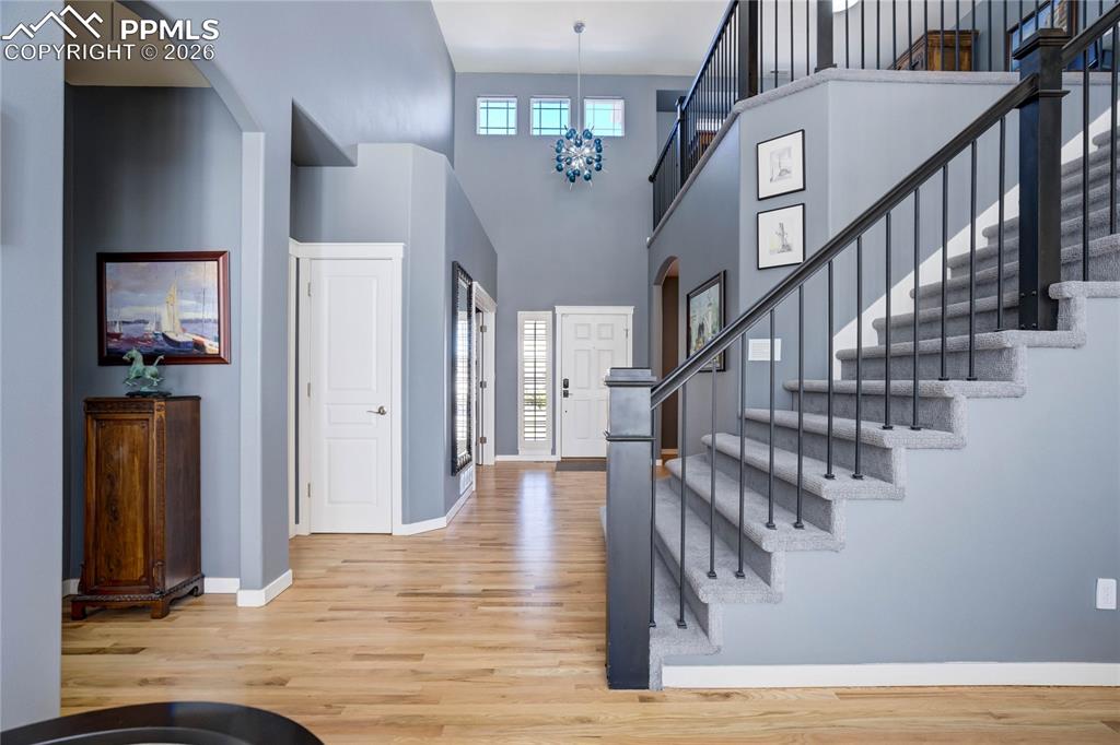 Entry showcasing the staircase to the upper level.