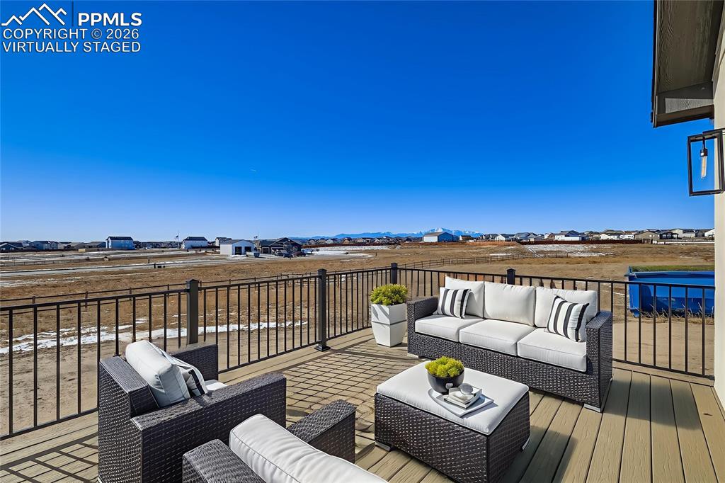 Virtually staged. Private deck offers the perfect spot for morning coffee or evening sunsets.
