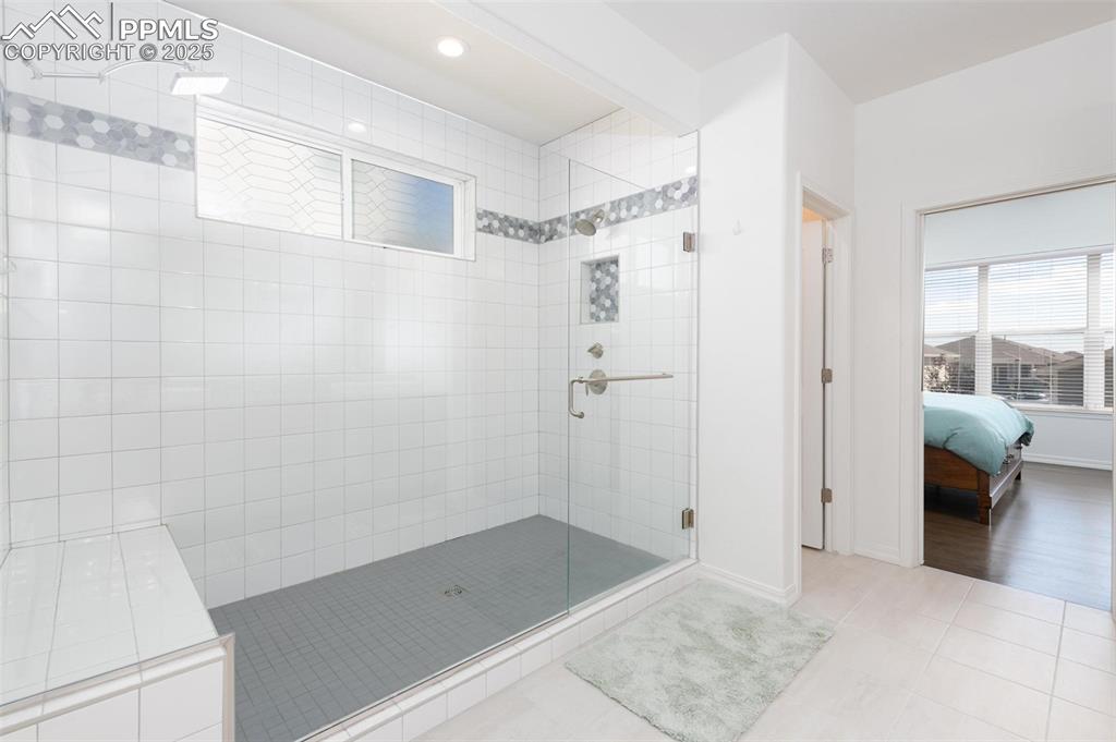 Large walk-in shower with two shower heads