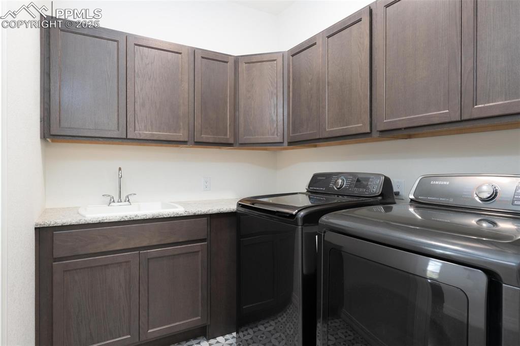 Laundry room with access to the Primary closet and the living room