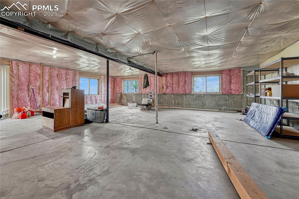 Below grade area featuring plenty of natural light