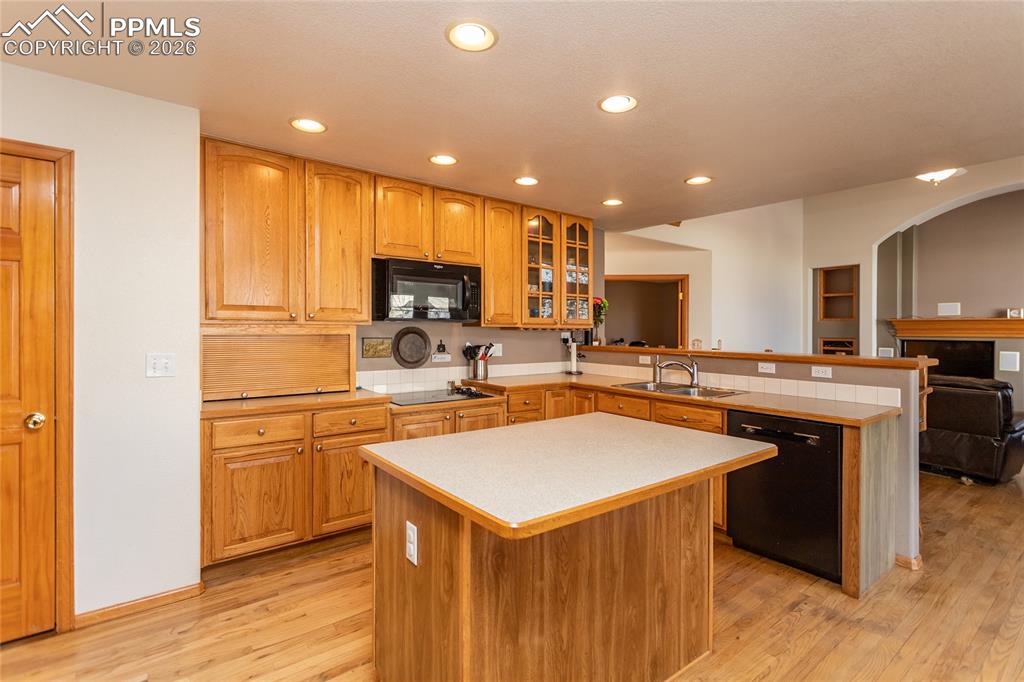 Kitchen with island a large walk-in pantry