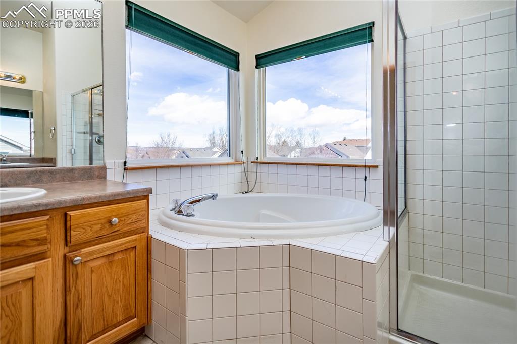 Deep soaking tub with corner windows