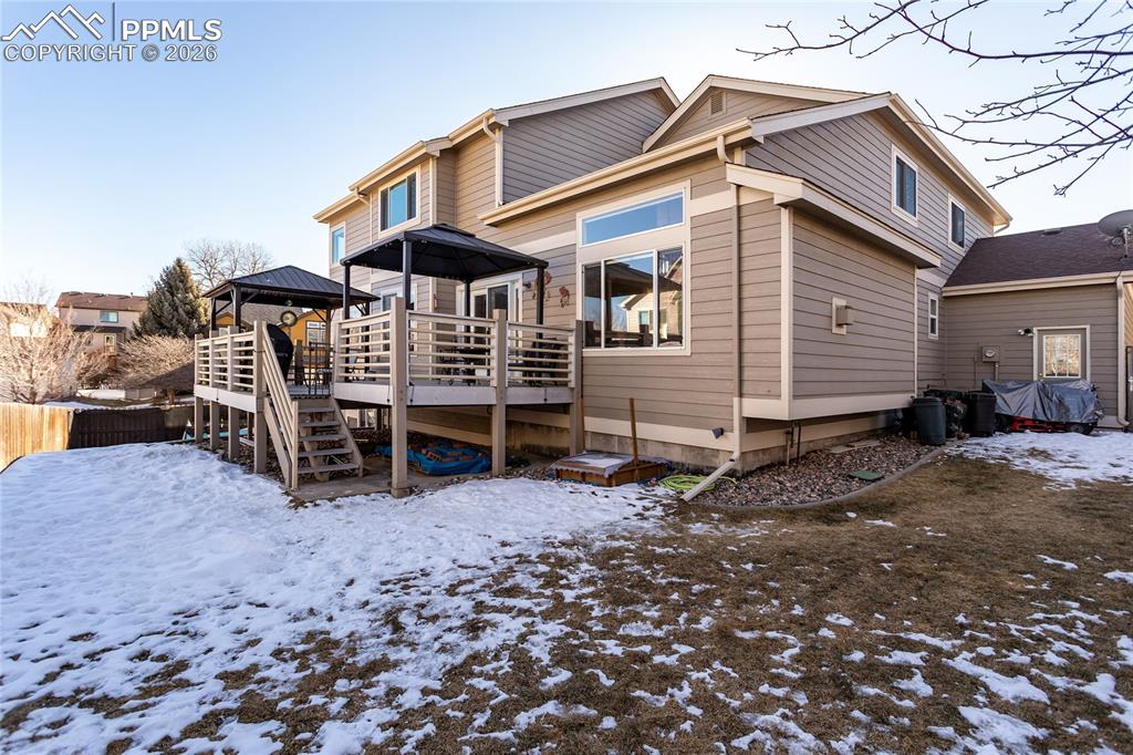 Tiered double deck with composite decking includes the 2 gazebos