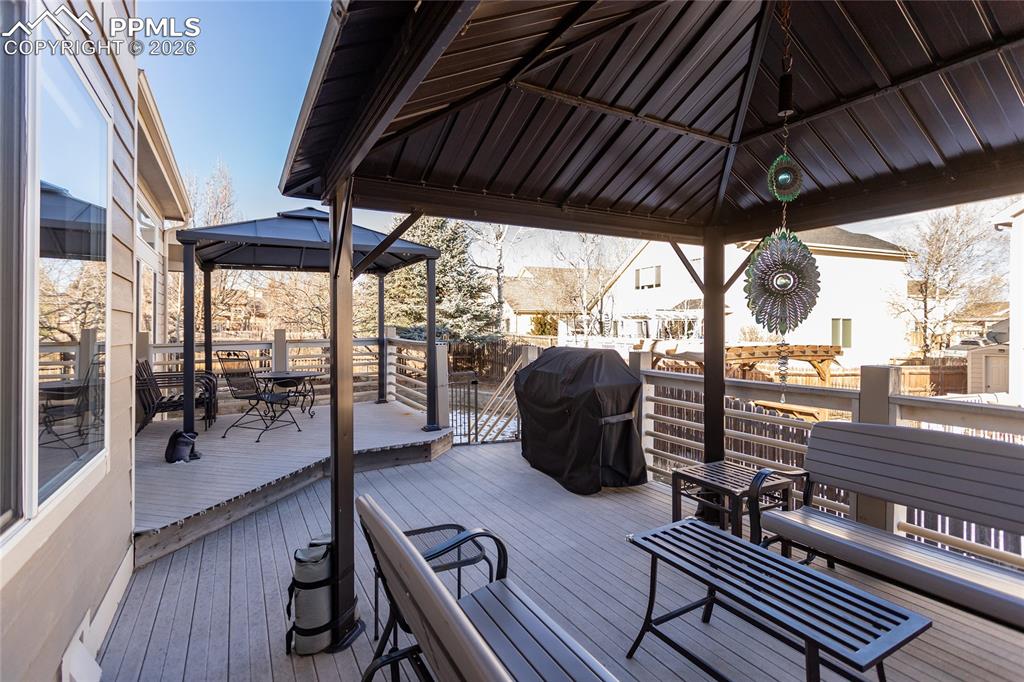 Tiered double deck with composite decking includes the 2 gazebos