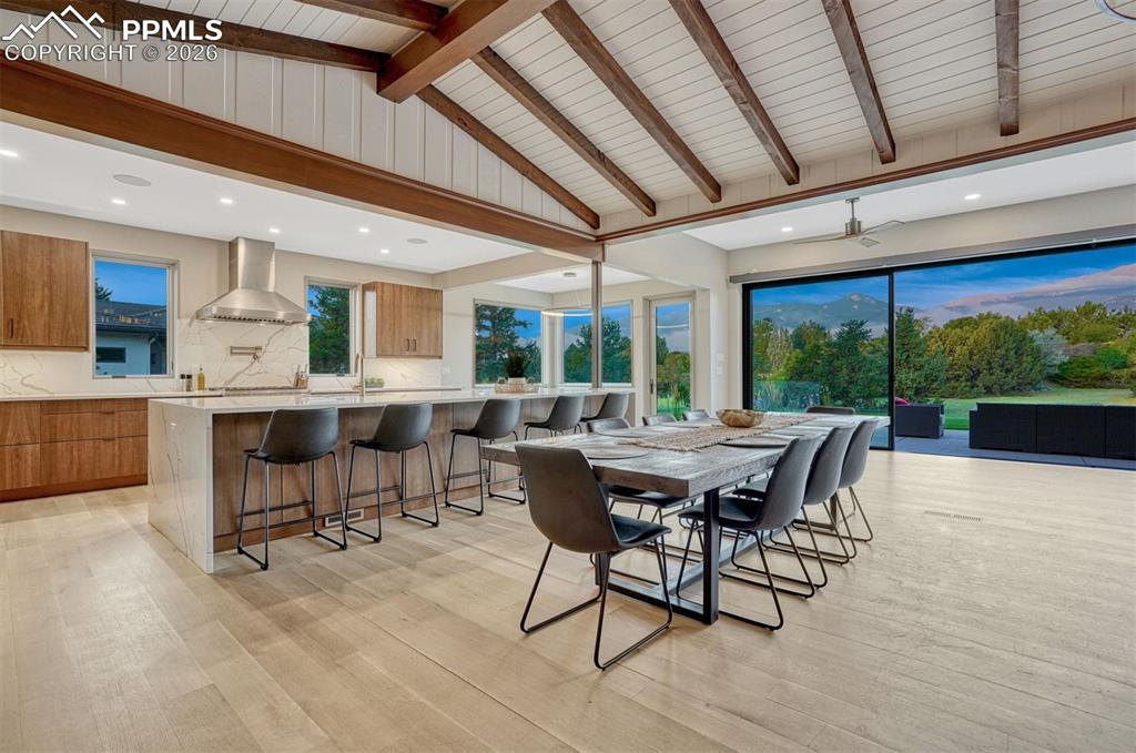 A chef-ready kitchen with all-new cabinets, 36-inch gas range, quartz counters, and white oak floors, perfect for cooking and entertaining.