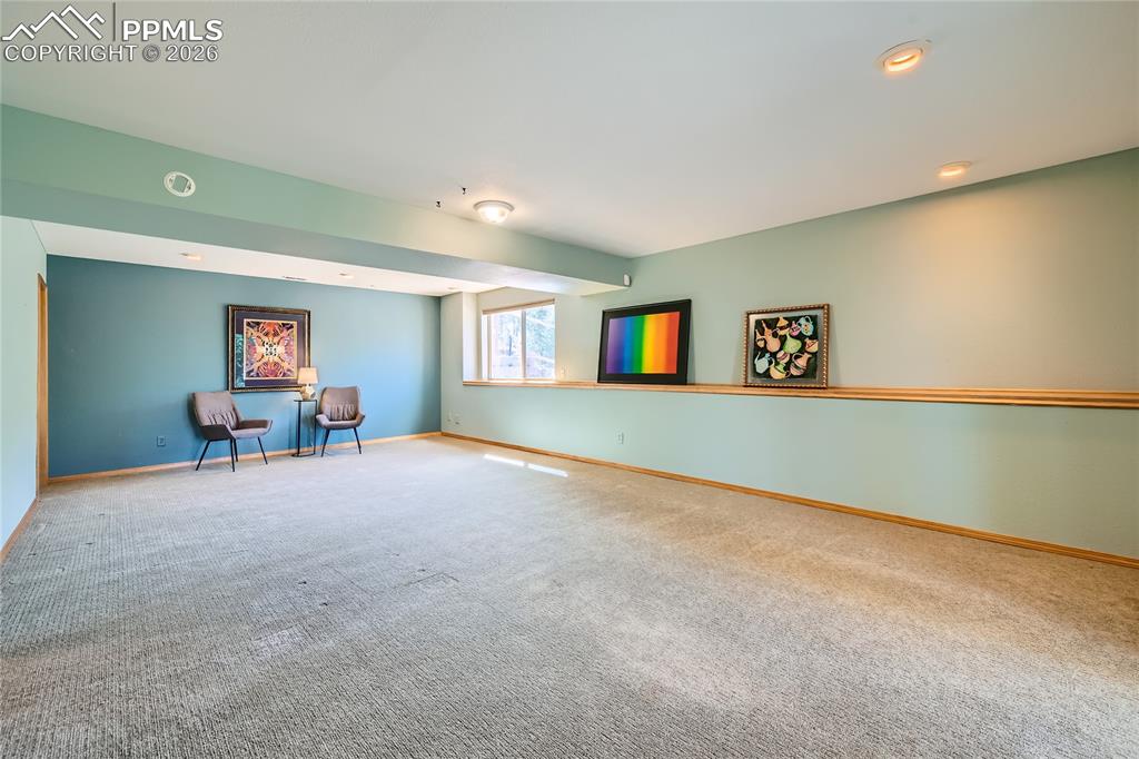 Lower level family room, ideal for office space, man-cave, entertainment center, art room, or mother-in-law suite
