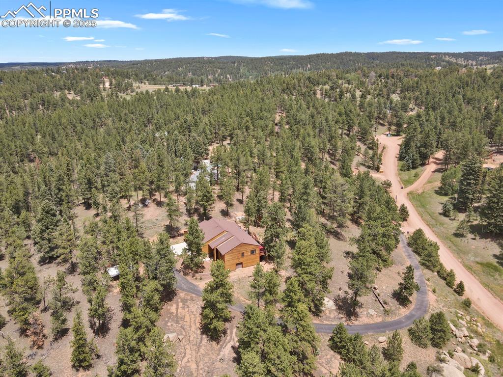 Aerial view of a heavily wooded area