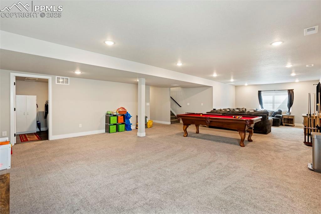 Playroom with light carpet, recessed lighting, and billiards