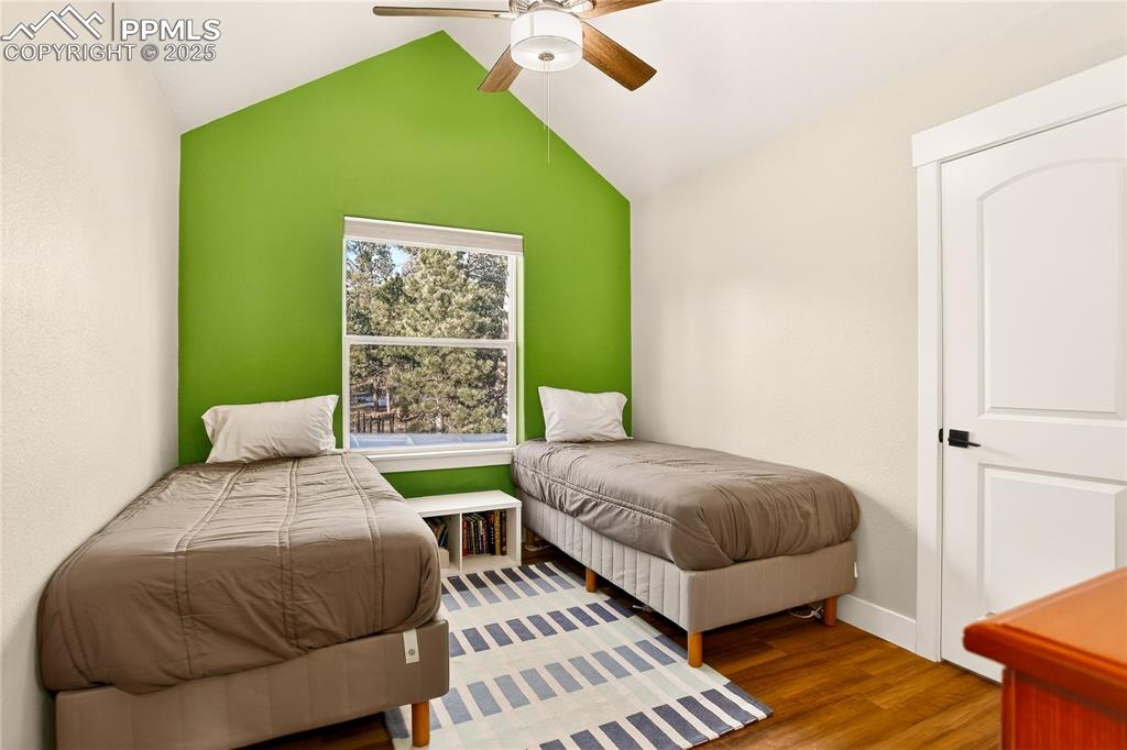 Upstairs bedroom 2 is large and has it's own walk-in closet and a view of the ponderosa pines