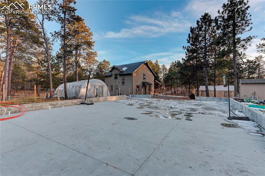 Partial Garage Foundation: Solid concrete slab already poured, with plumbing roughed in along with septic tie in, and water/gas pre-run. 