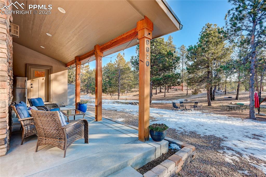 Enjoy Colorado wildlife from your covered patio overlooking the sand filled play area