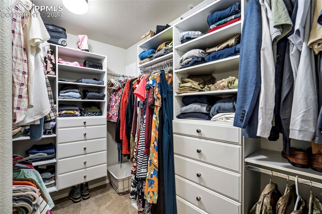 Primary Walk-in closet w/custom built-ins