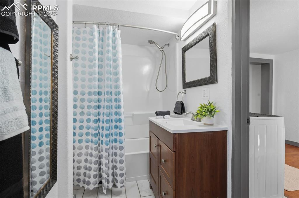 This 5' x 11' Full Bath recently painted, trimmed with newer vanity. 