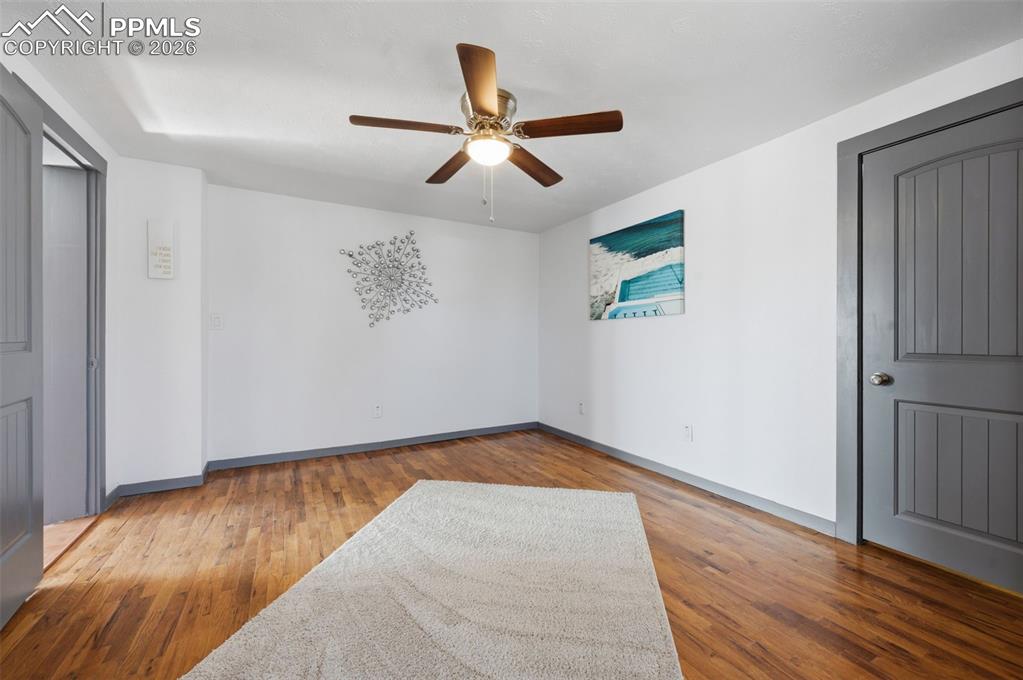 The original hardwood flooring is still beautiful and funcitonal in this room. 