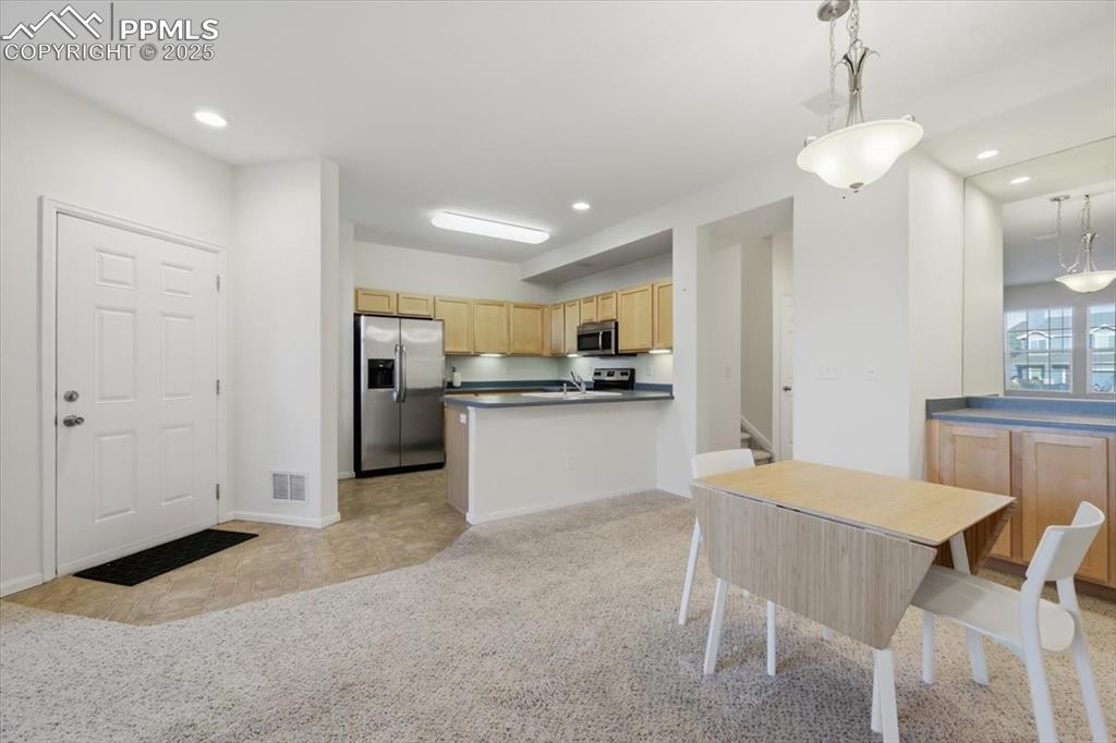 Dining area with coffee bar.