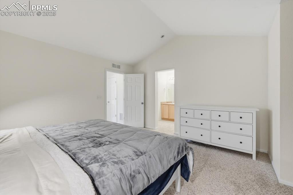 Primary suite with attached bathroom.