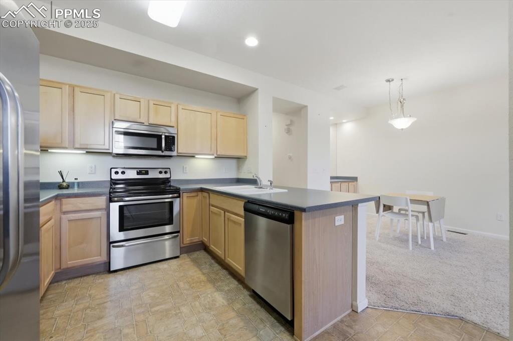 Lots of counter space and stainless steel appliances.