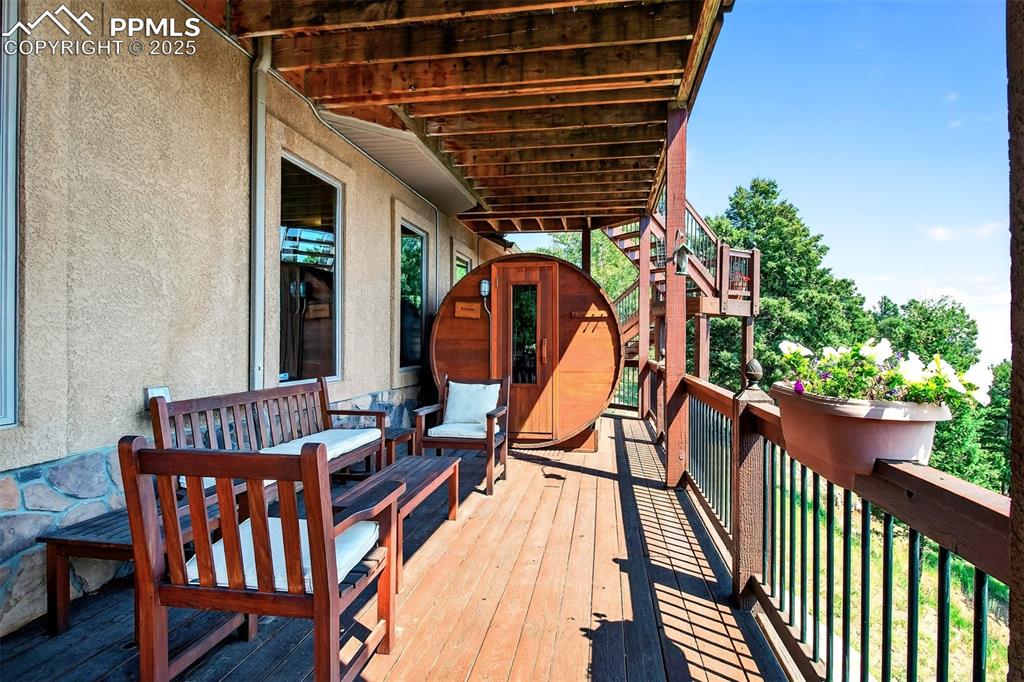 Covered lower level deck with sauna