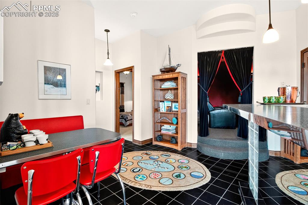 Wet bar going into the media room and bedroom 2 and 3