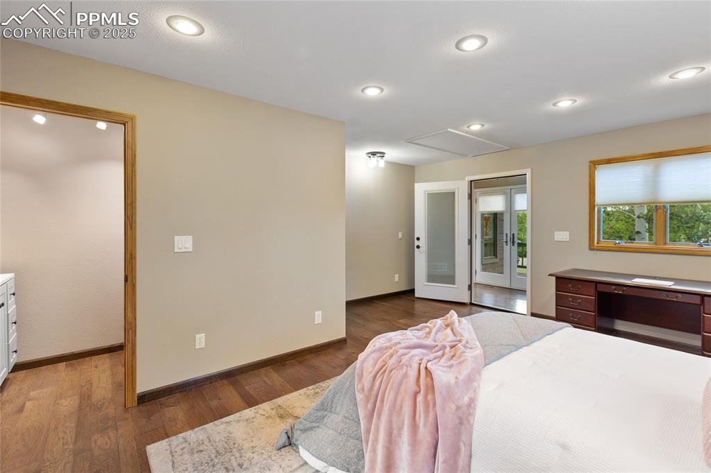 bedroom has access panel to reinforced storage area above