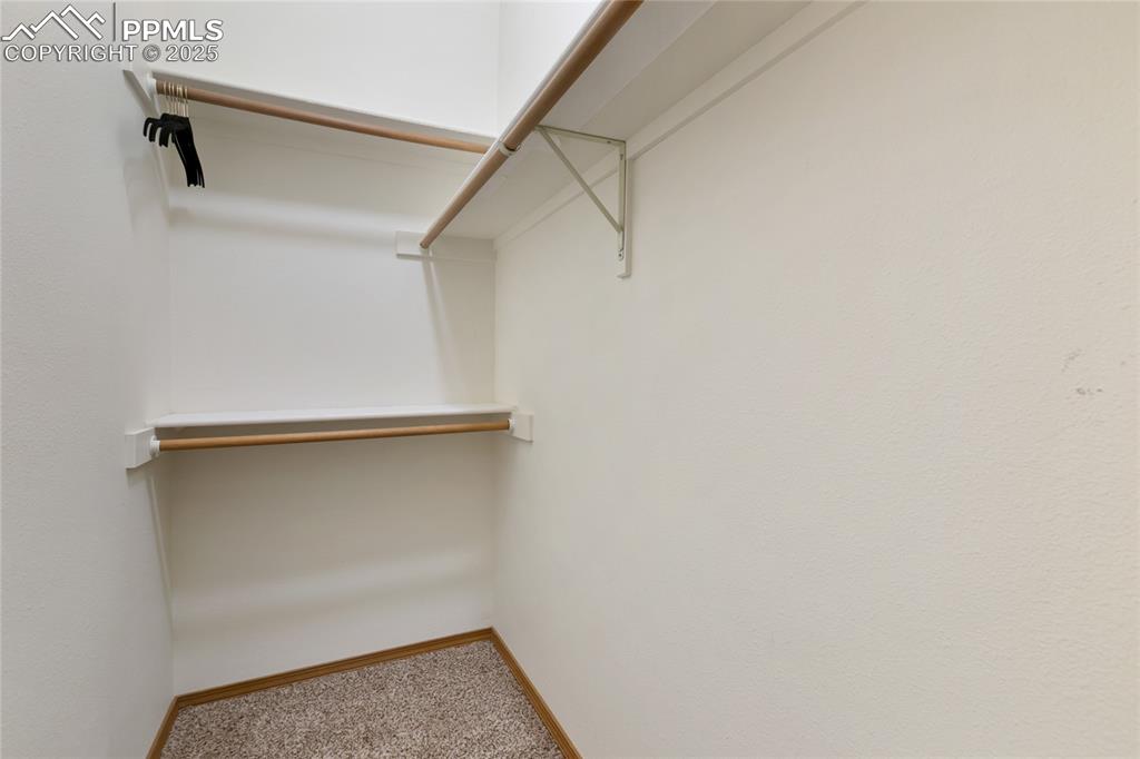 walk-in closet in upper level suite