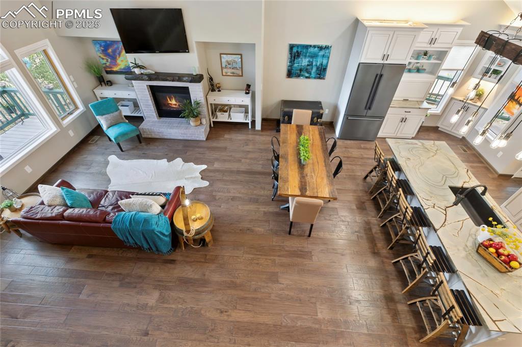 Beautiful living area with hand scraped hickory floors