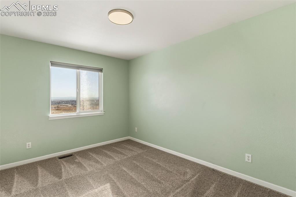 Bedroom 2 of 4, upper level faces south