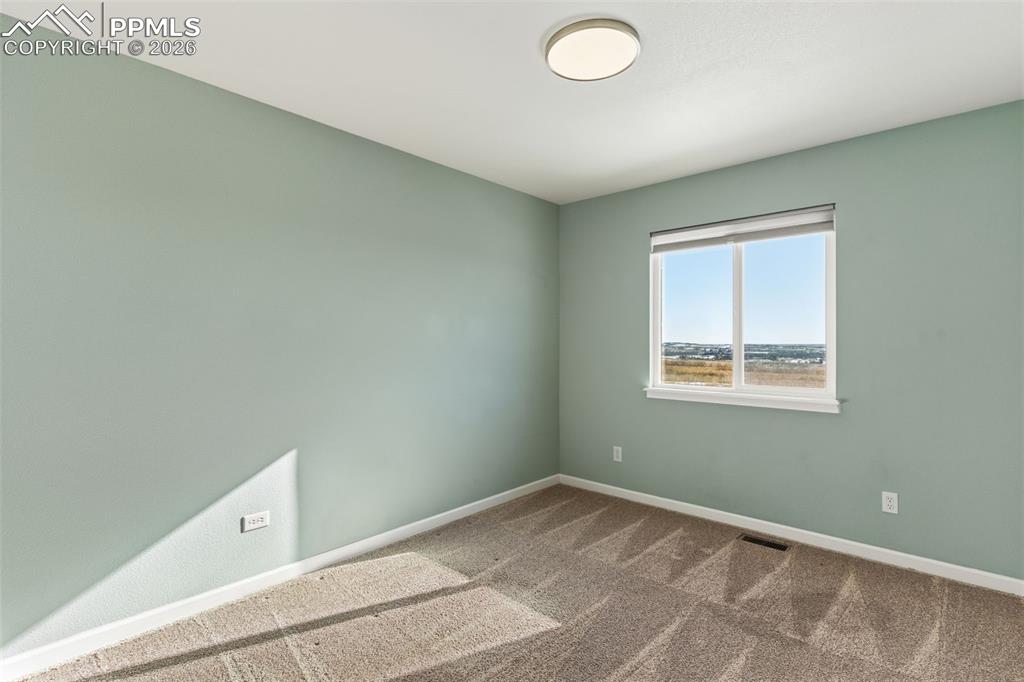 Bedroom 3 of 4, upper level faces south