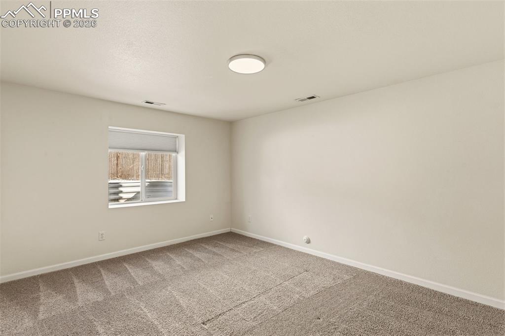 Bedroom 4 of 4, located on the lower level faces east