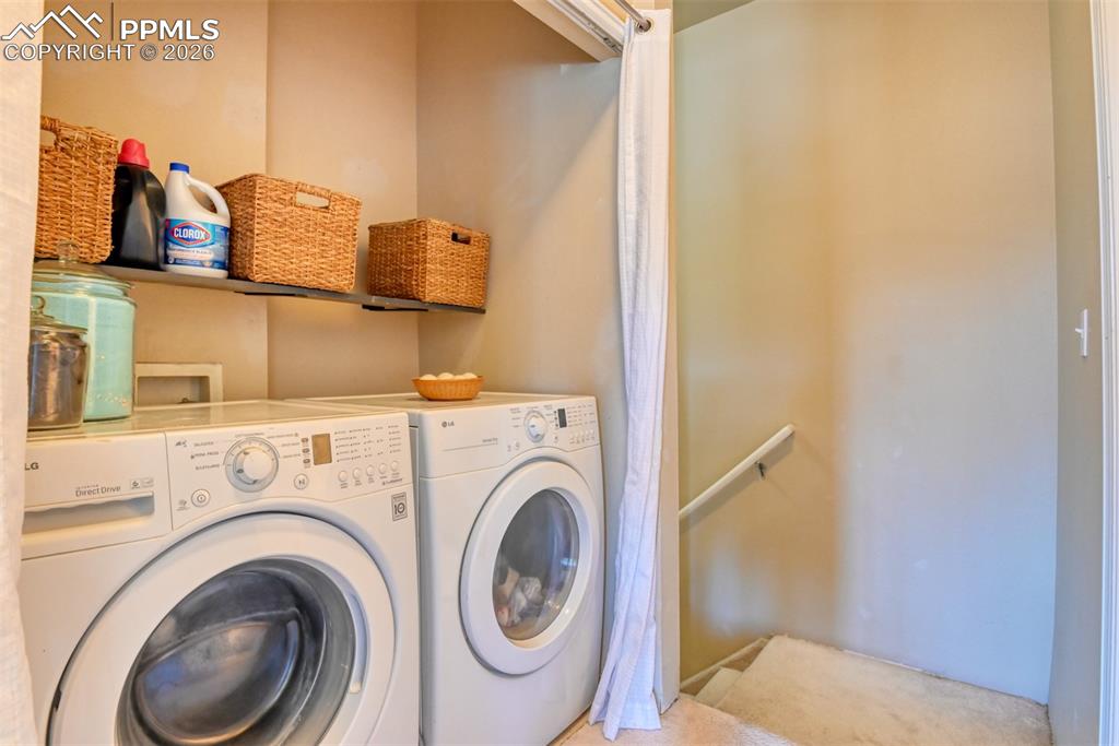 Laundry area featuring independent washer and dryer