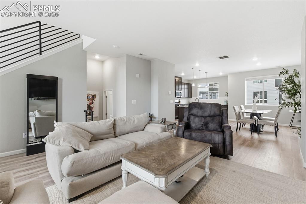 Notice rod iron railing on left that takes you upstairs