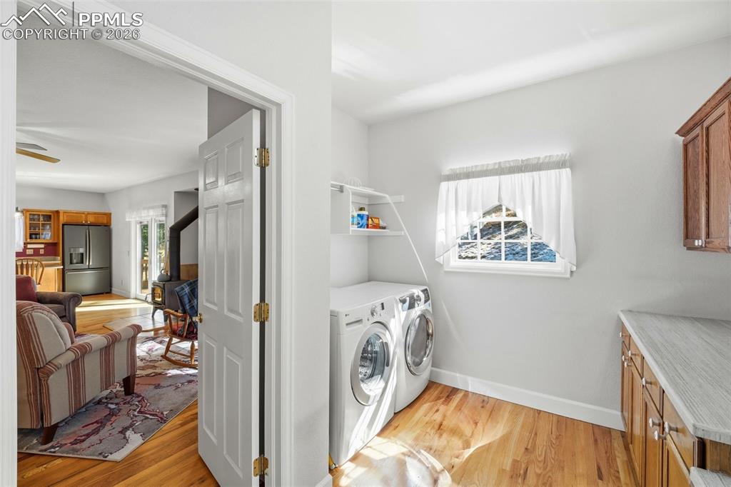 Laundry on Main Level with Cabinets and Folding Area
