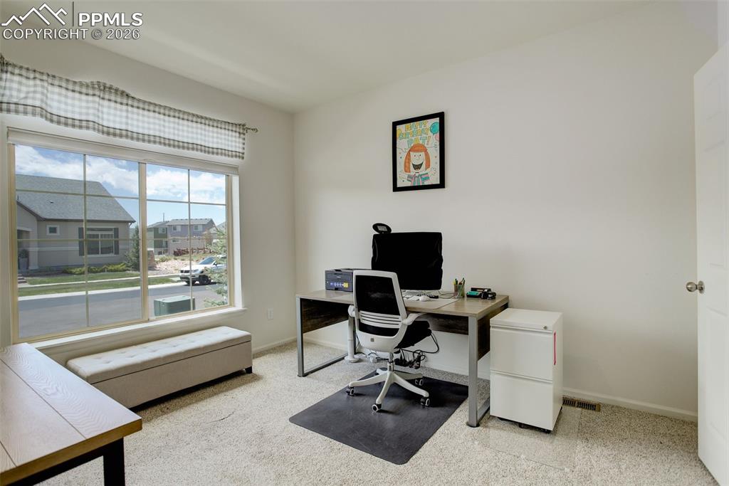 Front secondary bedroom wtih walk-in closet