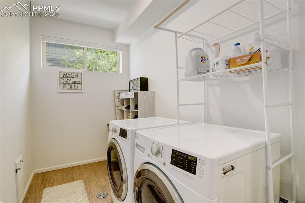Large laundry space with window and electric hook-ups