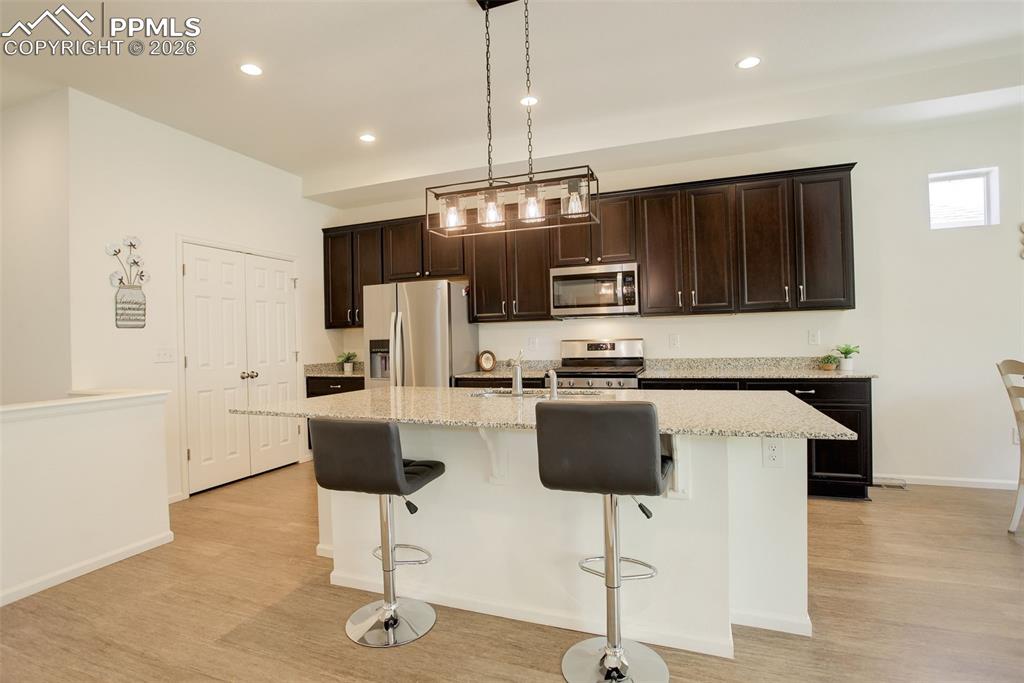 Large island with granite countertops